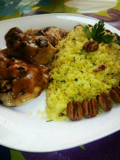 Una foto de Solomillo a la pimienta con cous-cous