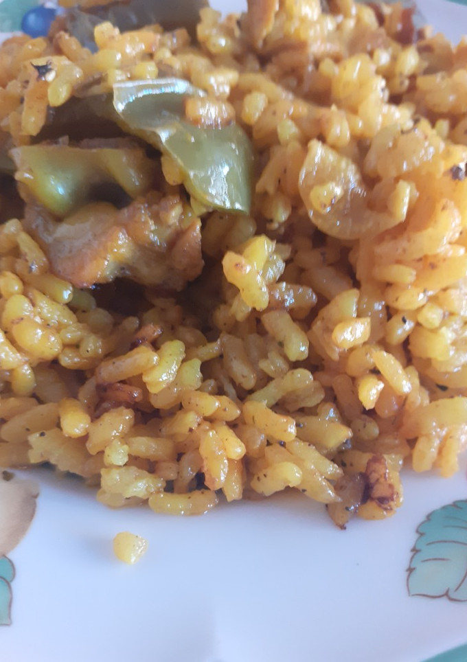 Una foto de Arroz con pollo a mi estilo