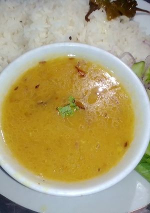 A picture of Zeera rice with masoor ki Daal.