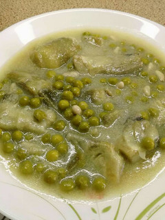 Una foto de Alcachofas con guisantes