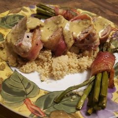 A picture of Brad's bacon wrapped pork tenderloin w/ hatch chile crema.