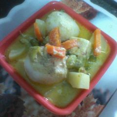 A picture of Rosgolla naboratan korma.