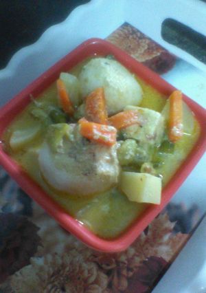 A picture of Rosgolla naboratan korma.