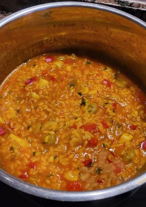 Una foto de Arroz meloso de sepia y gambas