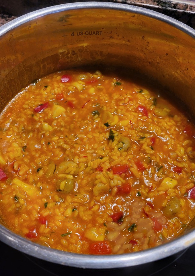 Una foto de Arroz meloso de sepia y gambas