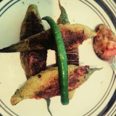A picture of Stuffed karela (bitter gourd).