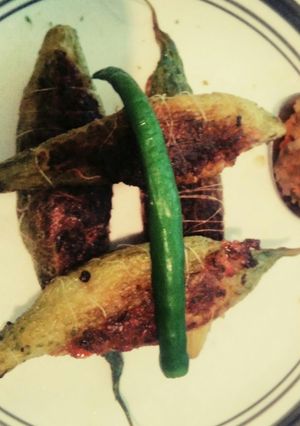 A picture of Stuffed karela (bitter gourd).