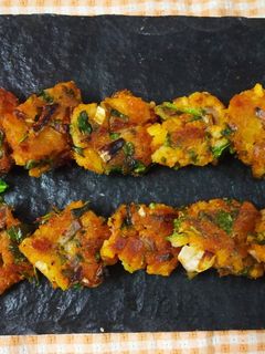 A picture of Palak poha fritters.