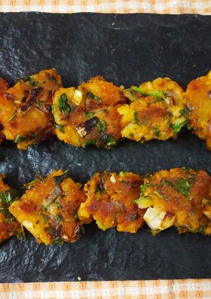A picture of Palak poha fritters.