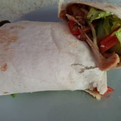 A picture of Giant Breaded chicken Wrap & Salad. 💜.