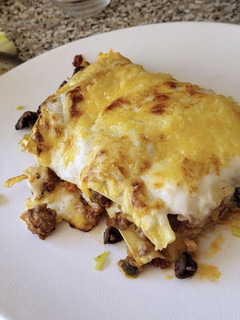 Una foto de Lasaña de carne y Senderuelas con Bechamel
