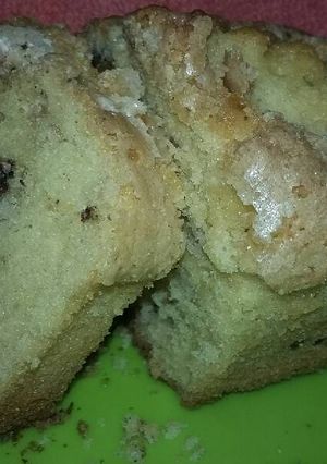 Una foto de Budín con frutos secos y chips!! ☕