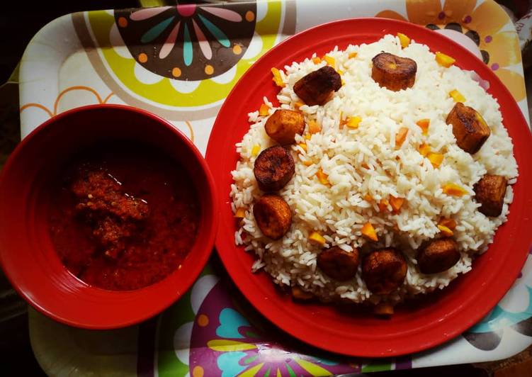 Simple Way to Prepare Award-winning Boiled rice with tomato sauce and fried plantain