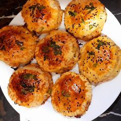 A picture of Chicken cheese patties.