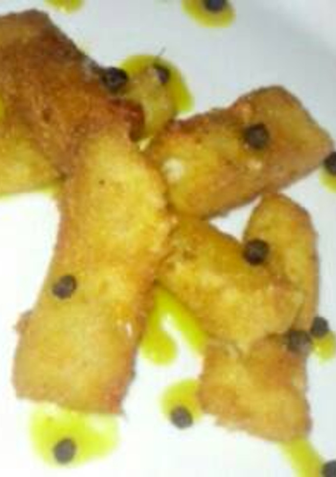 Una foto de Cheese fingers Lvll con salsa