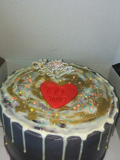 A picture of Orange tutti-fruity cake.
