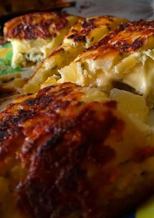 Una foto de Tortilla de papas, rellena de queso B)