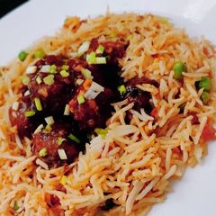A picture of Veg Manchurian with schezwan rice.