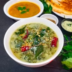 A picture of Harive Soppu Bendi / Amaranth leaves curry.
