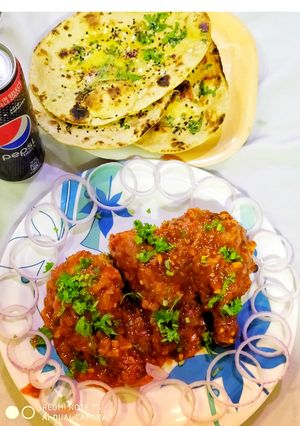 A picture of Honey Garlic Glazed Chicken drumsticks with Garlic Butter naan.