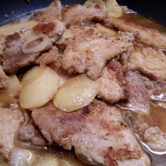 A picture of Skillet pork with potatoes.
