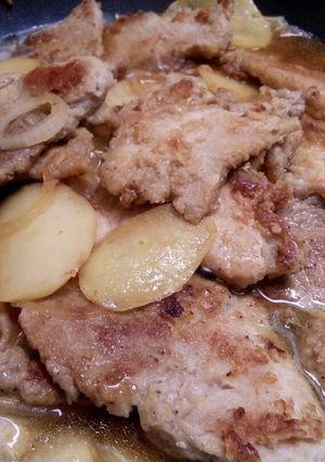 A picture of Skillet pork with potatoes.