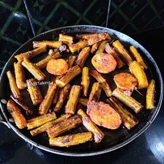 A picture of Drumsticks And Potato Fry.