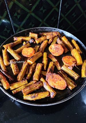 A picture of Drumsticks And Potato Fry.