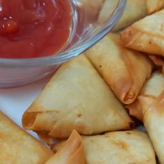 A picture of Mini Chicken cheese samosas.