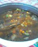 Caldo de pescado con mojarra frita