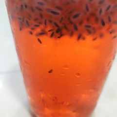 A picture of Rooh Afza with basil.