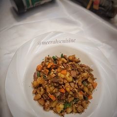 A picture of Potatoes and egg stir fry.