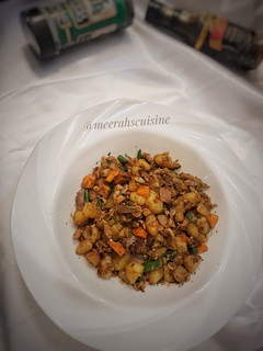 A picture of Potatoes and egg stir fry.
