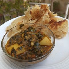 A picture of Methi aloo with paratha.