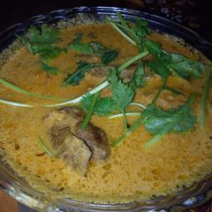 A picture of Varutharacha Chicken Curry - Fried & crushed Chicken curry.
