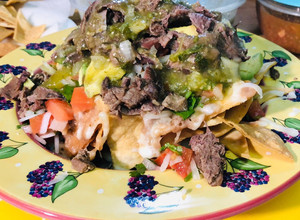Una foto de Nachos con Lengua de Res #superbowl