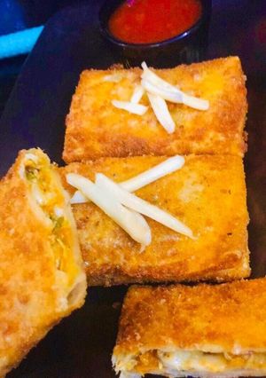 A picture of Chicken Cheese Chikki Mikki.
