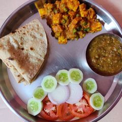 A picture of Matar Paneer Thali.