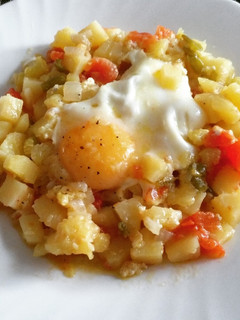 Una foto de Huevos al pisto