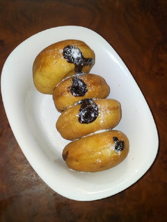 A picture of Fluffy chocolate filled Doughnuts.