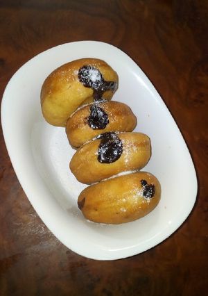 A picture of Fluffy chocolate filled Doughnuts.