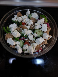 A picture of Greek Village Salad with Barley Rusk.