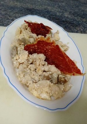 Una foto de Tapa revuelto merluza con champi