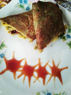 A picture of Whole moong dal &oats cheela stuffed with potato &paneer.