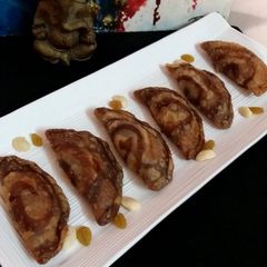 A picture of Boondi Stuffed Chocolate Gujiya..