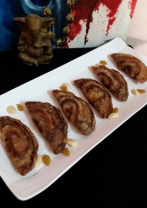 A picture of Boondi Stuffed Chocolate Gujiya..