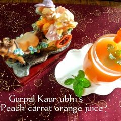 Peach, carrot & orange juice 🍑🥕🍊 A picture of Peach, carrot & orange juice 🍑🥕🍊.