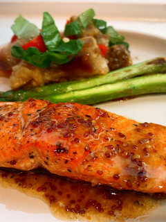 A picture of Salmon with lemon mustard sauce.