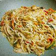 Wok de verduras con fideos de arroz