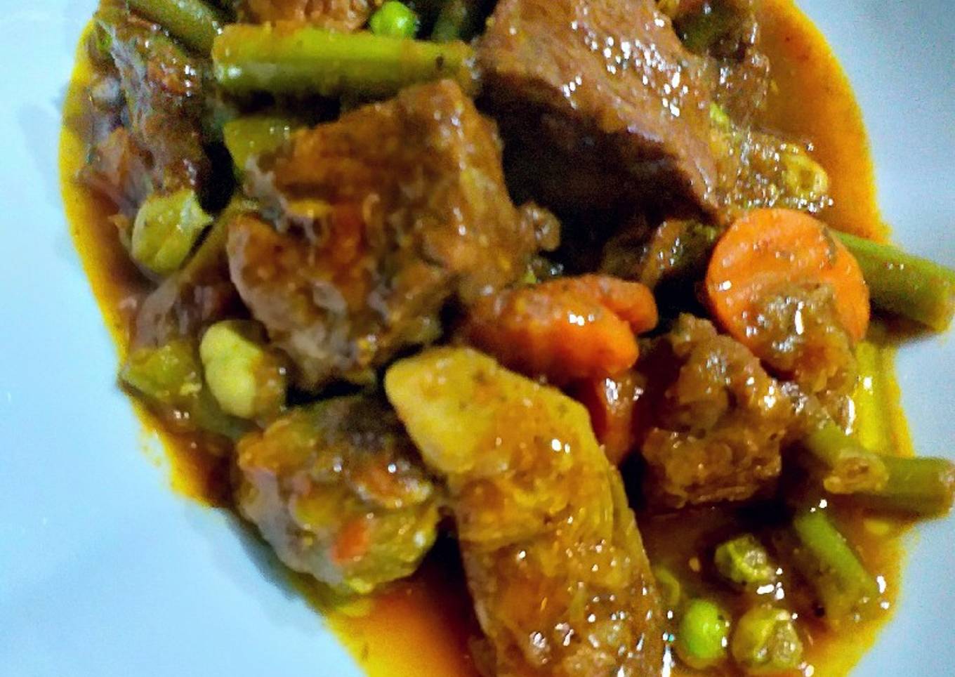 Ternera con menestra de yverduras y ras el hanout